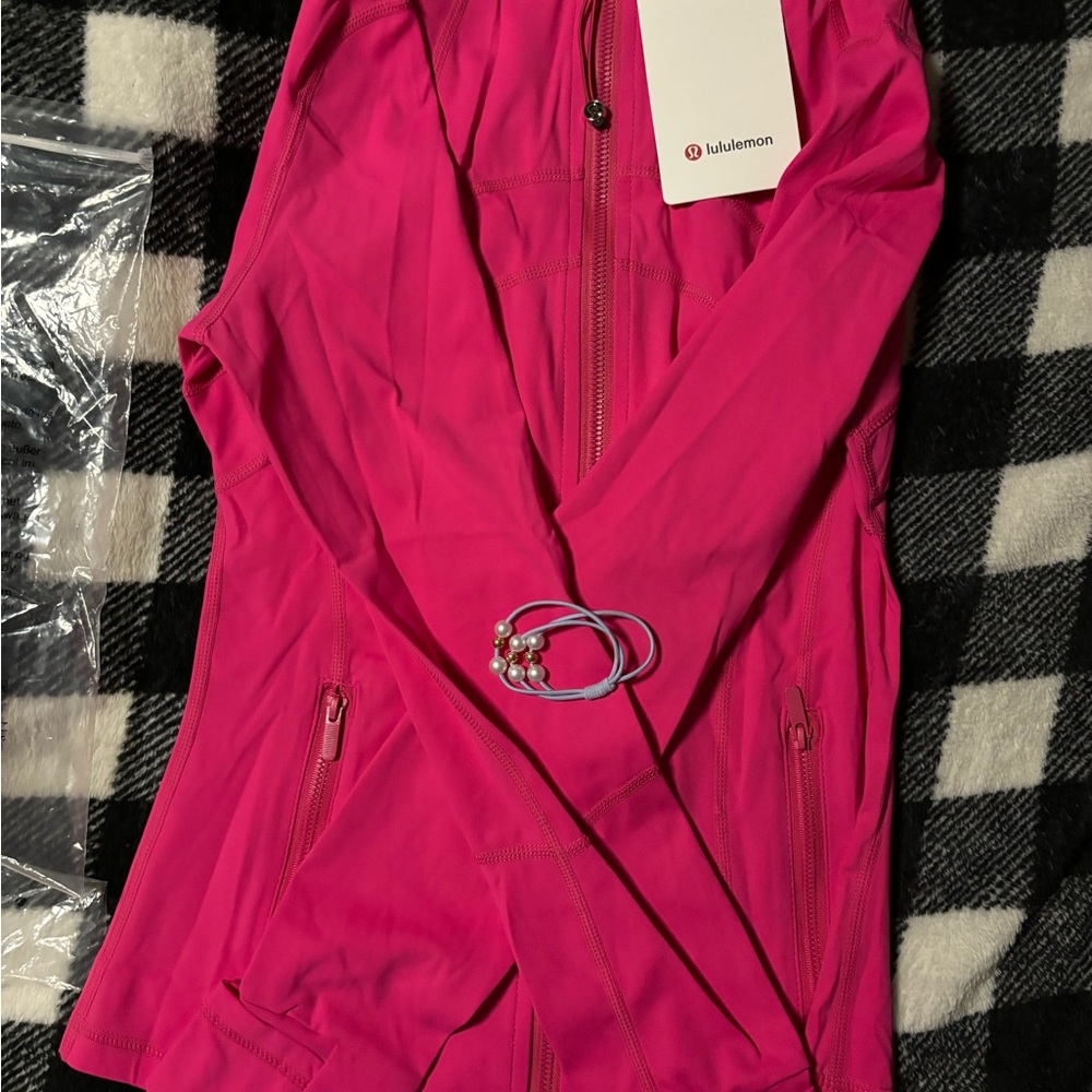 Size 4 brand new lululemon jacket